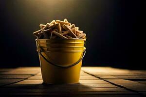 un Cubeta lleno con papas fritas en un de madera mesa. generado por ai foto