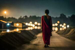 a woman in a red sari walks down a road at night. AI-Generated photo