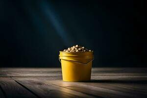 a yellow bucket filled with peanuts on a wooden table. AI-Generated photo