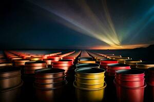 a row of oil drums with a bright light shining on them. AI-Generated photo