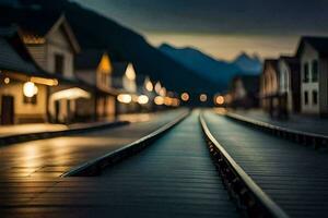 un tren pista en el medio de un pueblo a noche. generado por ai foto