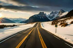 a road in the snow with mountains in the background. AI-Generated photo