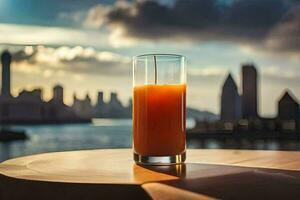 a glass of orange juice on a table in front of a city skyline. AI-Generated photo