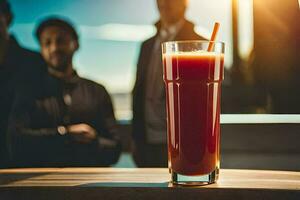 a glass of juice with a straw sitting on a table. AI-Generated photo