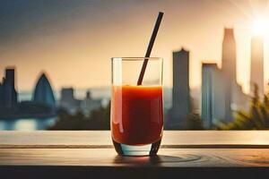 a glass of orange juice with a straw on a table in front of a city skyline. AI-Generated photo