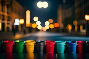 colorful cups lined up on a street at night. AI-Generated photo