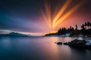 un largo exposición fotografía de un puesta de sol terminado un lago. generado por ai foto