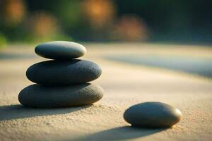 three stones stacked on top of each other in the sand. AI-Generated photo