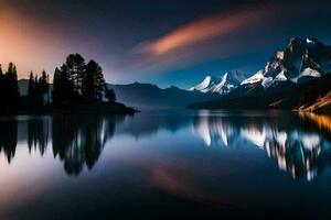 un montaña rango es reflejado en un lago a puesta de sol. generado por ai foto