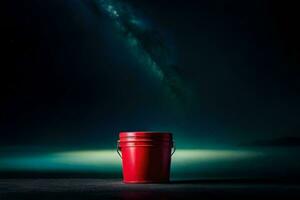 un rojo Cubeta sentado en un oscuro superficie con un brillante cielo en el antecedentes. generado por ai foto