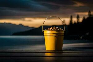 a bucket of nuts on a wooden table in front of a lake. AI-Generated photo