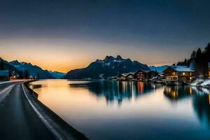 un lago y casas en el montañas a puesta de sol. generado por ai foto