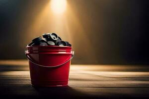 a red bucket filled with black balls on a wooden table. AI-Generated photo