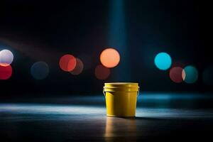 a yellow bucket sitting on a dark floor with lights in the background. AI-Generated photo