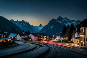 a town at dusk with mountains in the background. AI-Generated photo