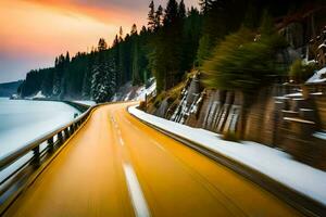 un coche conducción en un Nevado la carretera a puesta de sol. generado por ai foto
