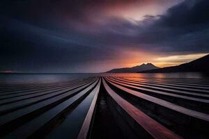 a long row of wooden benches on the shore of a lake. AI-Generated photo