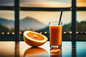 un vaso de naranja jugo con un rebanada de naranja en un mesa en frente de un montaña vista. generado por ai foto