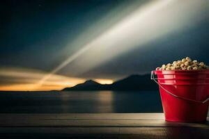 a bucket of popcorn on a table with a mountain in the background. AI-Generated photo