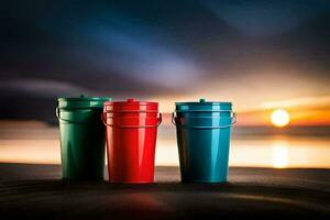 three colorful buckets on the beach at sunset. AI-Generated photo