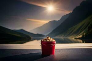 a bucket of popcorn on a table in front of a lake. AI-Generated photo