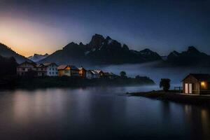 un lago y casas en el montañas a oscuridad. generado por ai foto