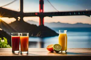 two glasses of juice and oranges sit on a table in front of a bridge. AI-Generated photo