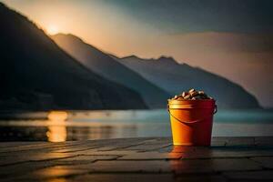 a bucket of nuts on the beach at sunset. AI-Generated photo