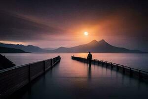 a man stands on a pier looking at the sun setting over the water. AI-Generated photo