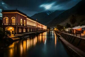 un canal en el medio de un pueblo a noche. generado por ai foto