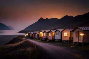 a row of beach huts on the road at night. AI-Generated photo
