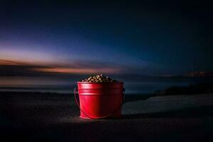 un rojo Cubeta lleno con pescado en el playa. generado por ai foto