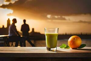 a glass of juice with a sunset in the background. AI-Generated photo
