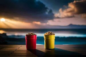 two colorful cups sitting on a wooden table with a sunset in the background. AI-Generated photo