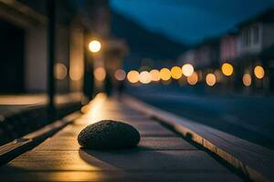 a stone sits on a wooden walkway at night. AI-Generated photo