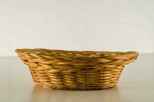 a wicker basket on a table photo