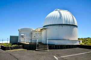 the observatory building at the top of the mountain photo