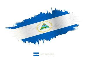 Painted brushstroke flag of Nicaragua with waving effect. vector