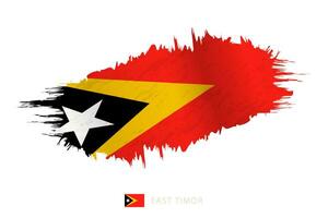 pintado pincelada bandera de este Timor con ondulación efecto. vector