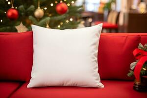 Blank white pillow mockup on red sofa with christmas tree and lights bokeh background. Holiday template composition with decoration. Copy space. photo