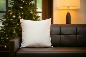 Blank white pillow mockup on black leather sofa with christmas tree and lights bokeh background. Holiday template composition with decoration. Copy space. photo