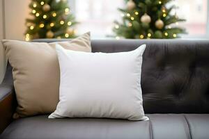 Blank white pillow mockup on black sofa with christmas tree and lights bokeh background. Holiday template composition with decoration. Copy space. photo