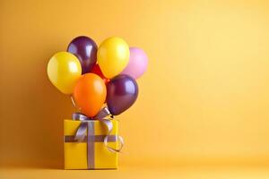 Colorful balloons bunch tied with a gift box on a yellow wall background with copy space. Birthday, wedding, party or celebration concept. Generated AI. photo