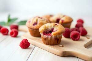 Raspberry muffins with fresh raspberries on a white wooden table, close up. A delicious dessert or breakfast. AI generated. photo