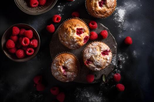 Raspberry muffins with fresh raspberries on a table, close up, dark background. Top view. A delicious dessert or breakfast. AI generated. photo