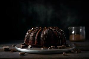 Delicious chocolate bundt cake topped dessert with ganache glaze on dark background with copy space. Ai generated. photo