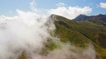 A majestic mountain range engulfed in clouds video