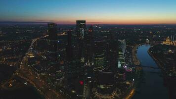 Skyscrapers of Moscow City Business Center and City Skyline in Morning Twilight. Aerial View. Drone is Flying Forward. Establishing Shot video