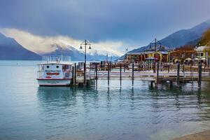 QUEENSTOWN NEW ZEALAND - SEPTEMBER 5,2015  beautiful scenic of port of lake wakatipu in queenstown most important traveling destination in southland new zealand photo