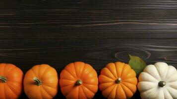 Autumn background with pumpkins and leaves on a black wooden background Generative AI photo